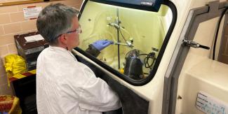 Mary Embree processing gold-199 in the glovebox at Missouri University Research Reactor. 